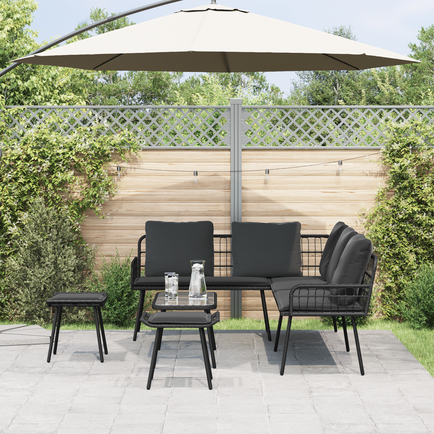 4-Delt Havemøbelsæt Med Puder Sort Poly Rattan